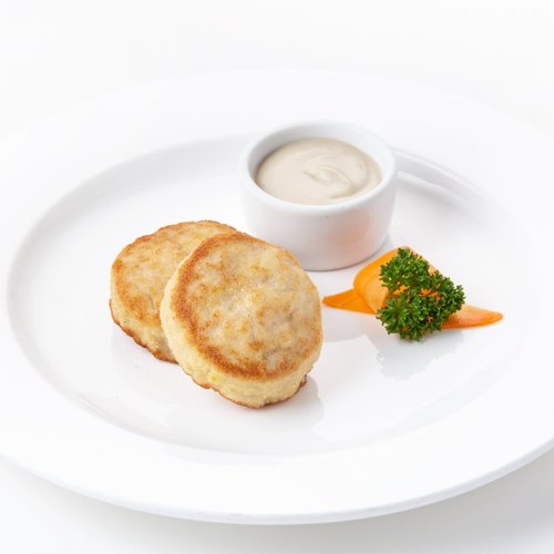 Биточки из кролика, чиненные овощами и грибным соусом