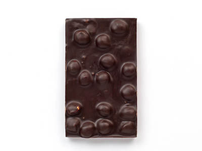 Handmade dark chocolate with hazelnuts